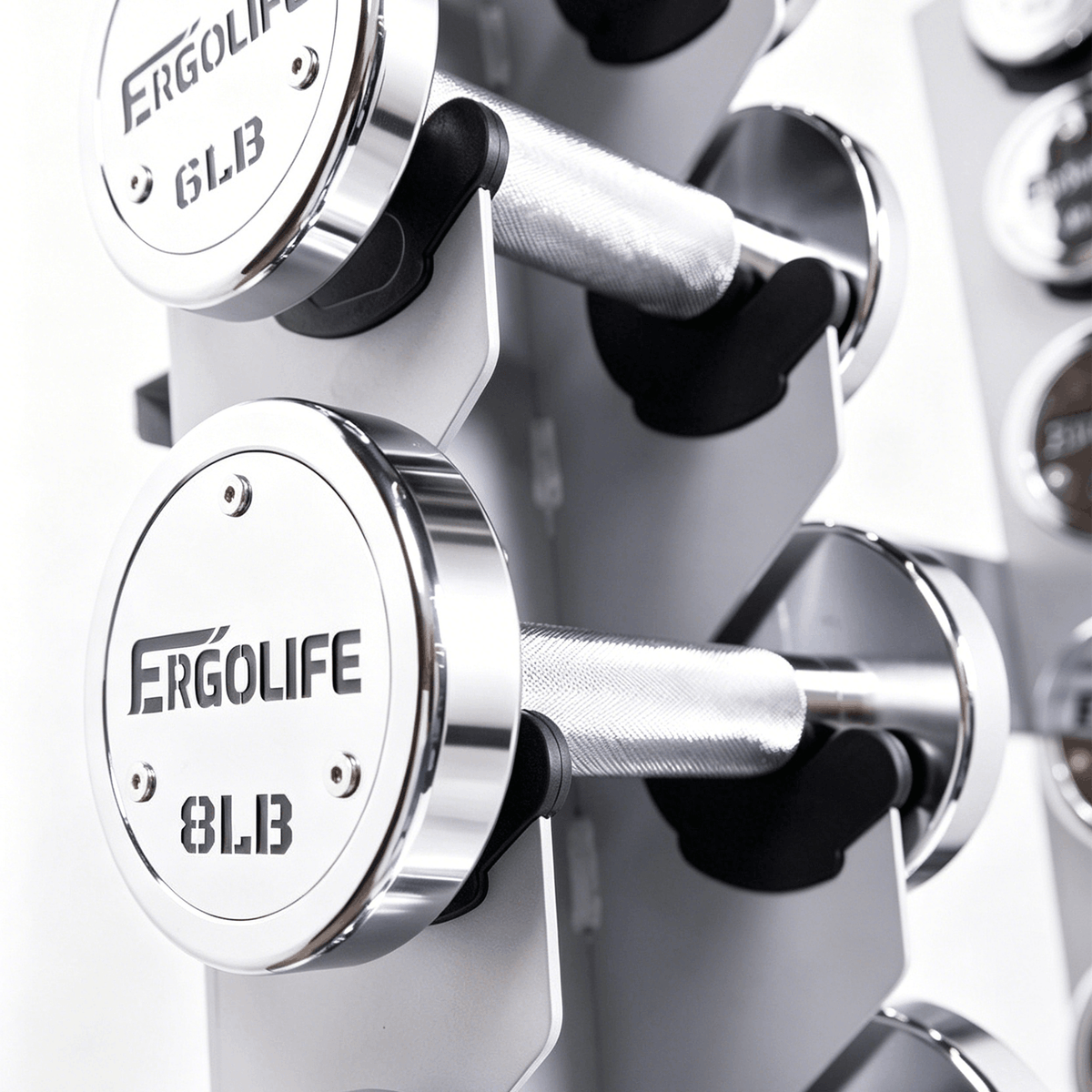 Custom commercial dumbbell featuring laser-cut logo plate and precision facility branding.